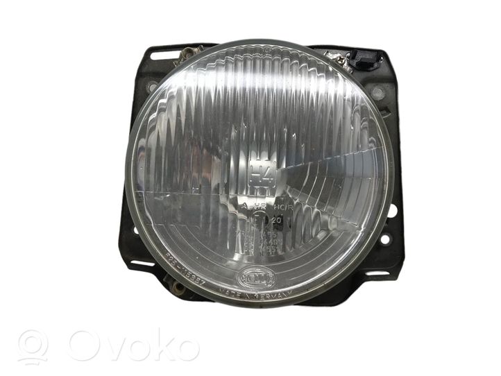 Volkswagen Golf II Lampa przednia 7R0114551