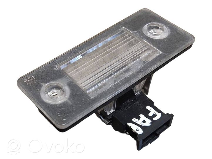 Skoda Fabia Mk2 (5J) Lampa oświetlenia tylnej tablicy rejestracyjnej 6Y0943021E