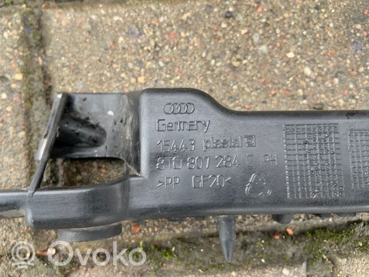 Audi A5 8T 8F Uchwyt / Mocowanie błotnika przedniego 8T0807284C