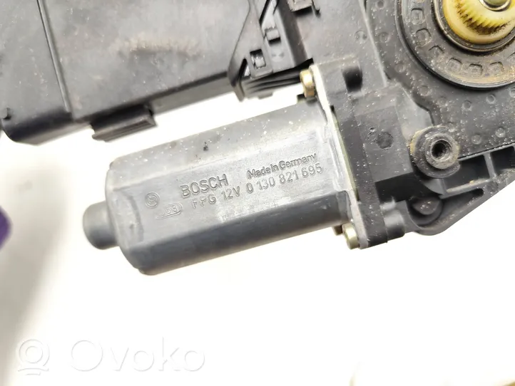 Volkswagen PASSAT B5.5 Front door window regulator motor 0130821695