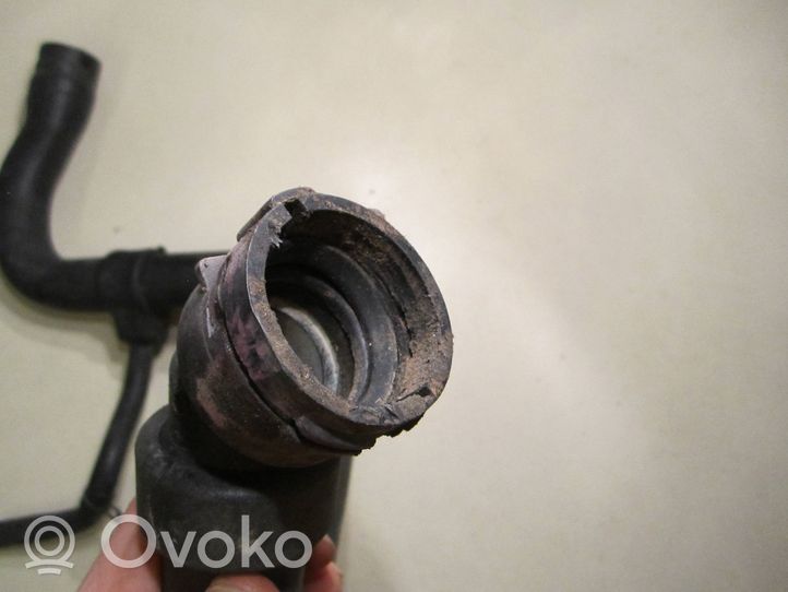 Volkswagen PASSAT B5 Engine coolant pipe/hose 8D0121101J