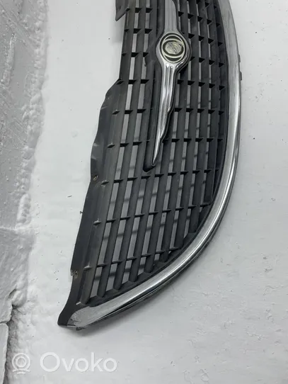 Chrysler Grand Voyager IV Grille calandre supérieure de pare-chocs avant 4857522AA