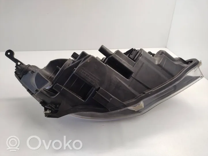 Opel Astra J Lampa przednia 1EG01001107