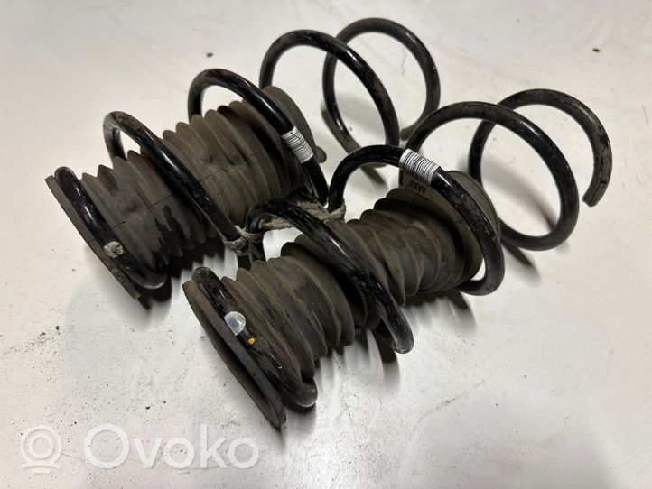 Opel Corsa E Front coil spring 