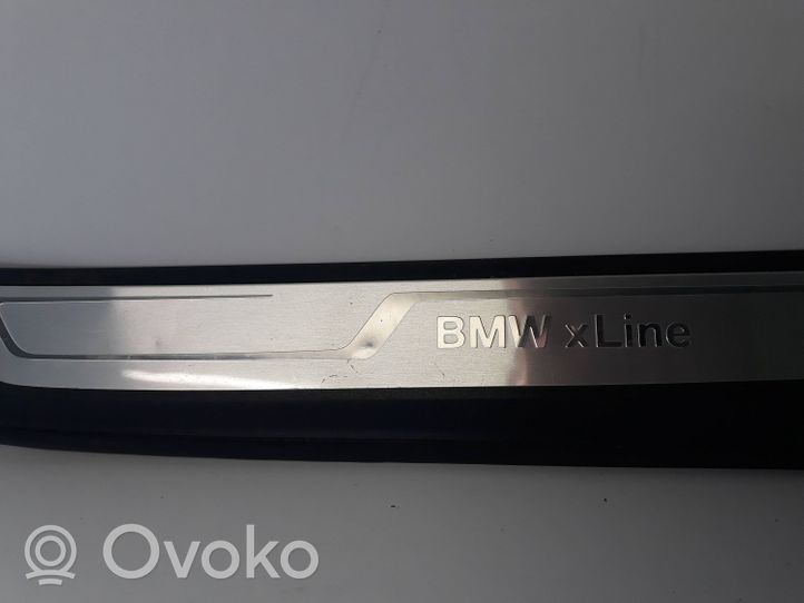 BMW X1 E84 Etuoven kynnyksen suojalista 7318565