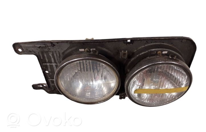 BMW 3 E30 Lampa przednia 310110480