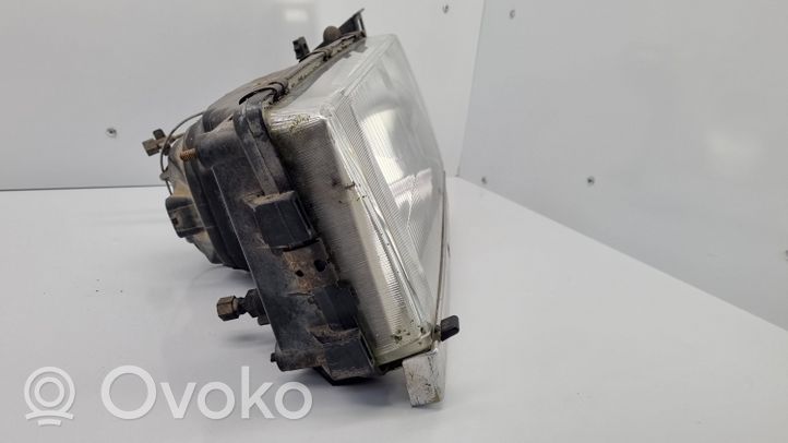 Volvo 740 Lampa przednia 1305239009