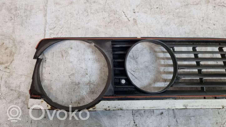 Volkswagen Golf II Front bumper upper radiator grill 191853653B