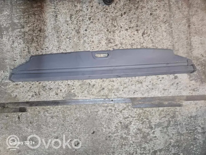 KIA Carens II Parcel shelf load cover 