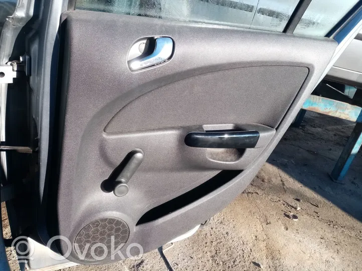 Opel Corsa D Boczki / Poszycie drzwi tylnych P0112462