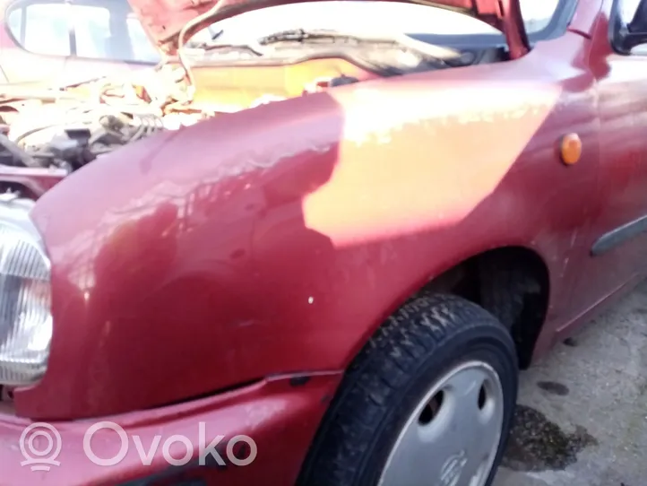 Nissan Micra C+C Błotnik przedni 6310150B30