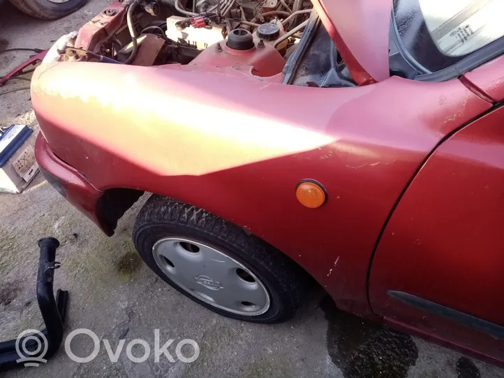 Nissan Micra C+C Błotnik przedni 6310150B30