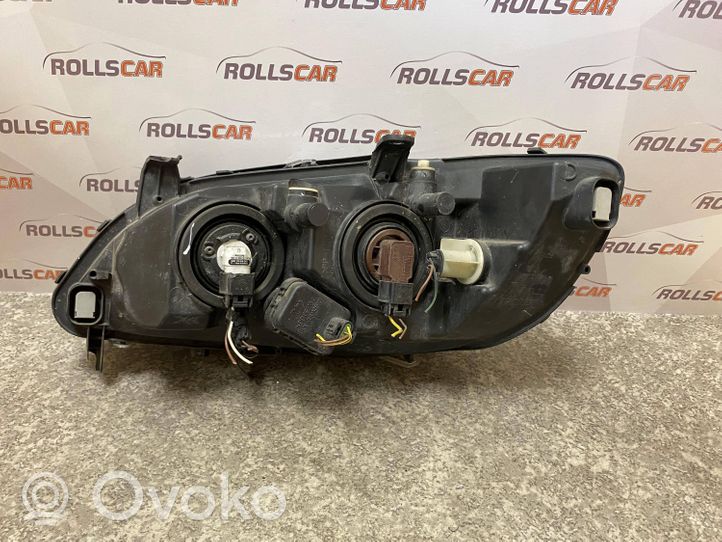 Opel Zafira A Lampa przednia 89100055