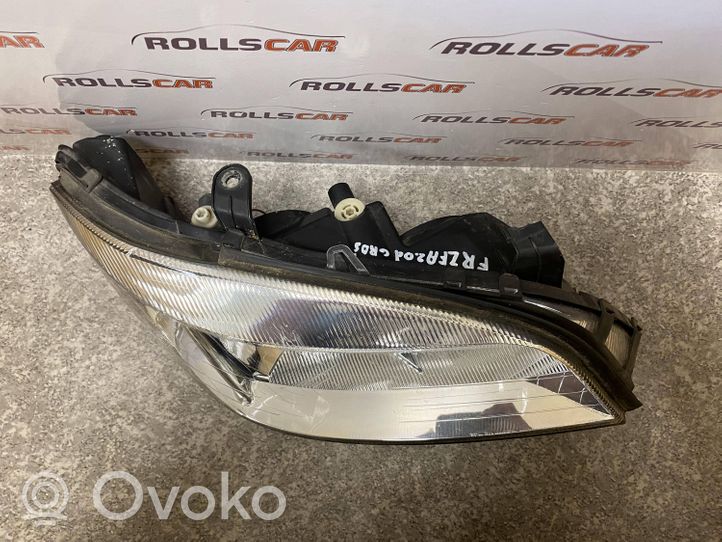 Opel Zafira A Lampa przednia 89100055