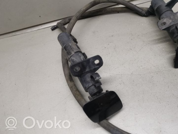 Volkswagen Touareg I Dysza spryskiwacza lampy przedniej 7L6955978A