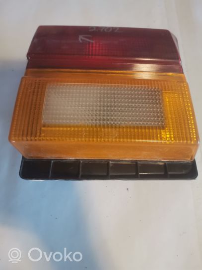 Audi 200 Lampy tylnej klapy bagażnika 443945226