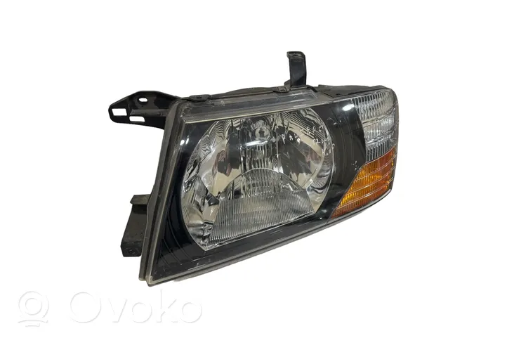 Mitsubishi Pajero Lampa przednia 10087420