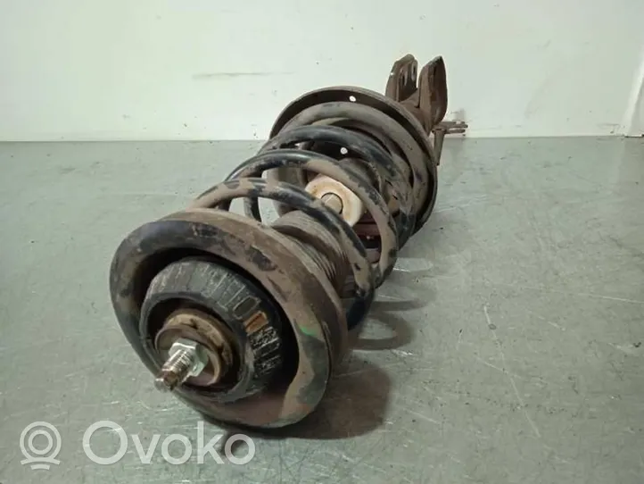 Opel Omega B1 Front shock absorber with coil spring 90447376