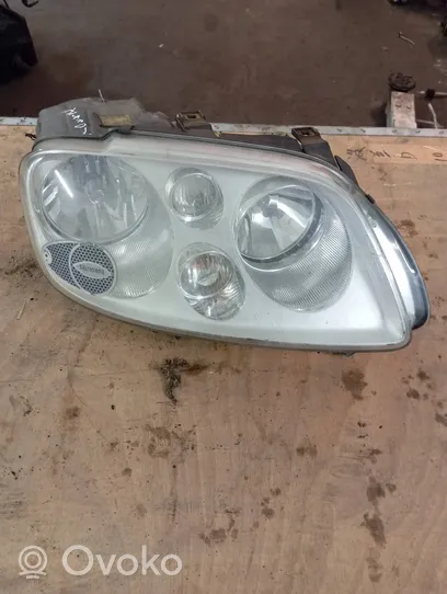 Volkswagen Touran I Lampa przednia 1T0941006E