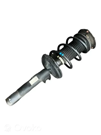 Volkswagen Golf VII Front shock absorber with coil spring 5Q0413023FJ