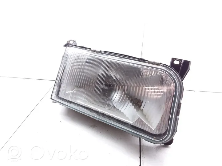 Volkswagen PASSAT B3 Lampa przednia 13348000