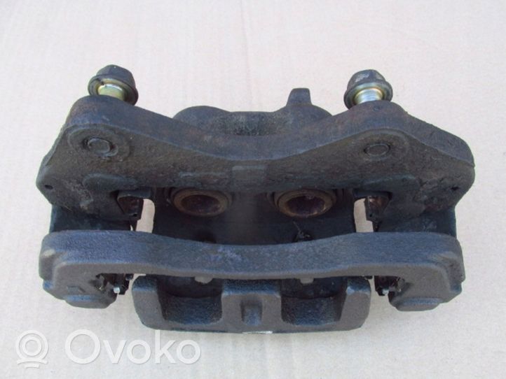 Mitsubishi Pajero Sport I Caliper de freno delantero 