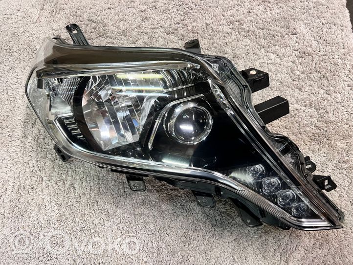 Toyota Land Cruiser (J150) Lampa przednia 8114560J20