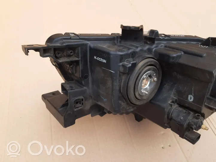 Mitsubishi Pajero Uchwyt / Mocowanie lampy przedniej 8301A878