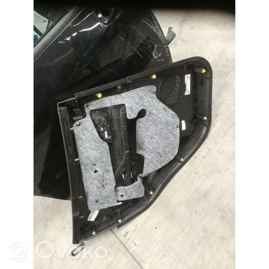 Opel Mokka Takaoven verhoilu 