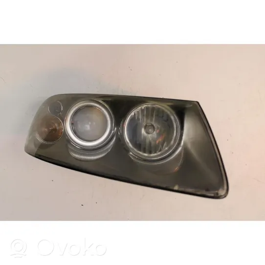 Volkswagen Touareg I Headlight/headlamp 7L6941016CE