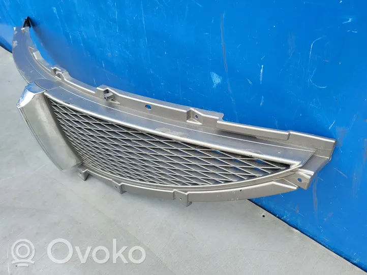 SsangYong Actyon Maskownica / Grill / Atrapa górna chłodnicy 7945132100