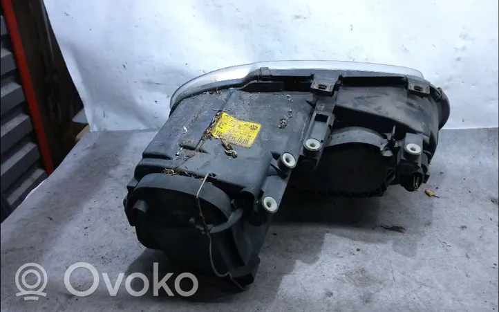 Volkswagen Touran I Lampa przednia 1T0941005R