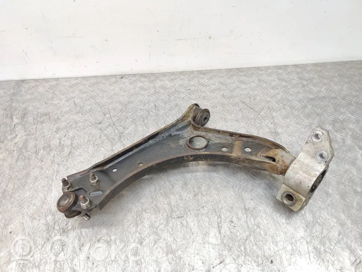 Volkswagen Caddy Front lower control arm/wishbone 1K0407190E