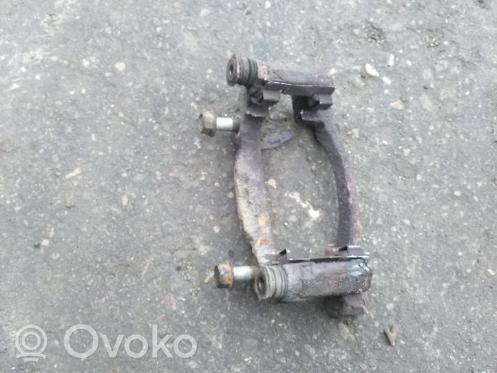 Toyota Corolla E120 E130 Plaquette / support d'étrier avant 