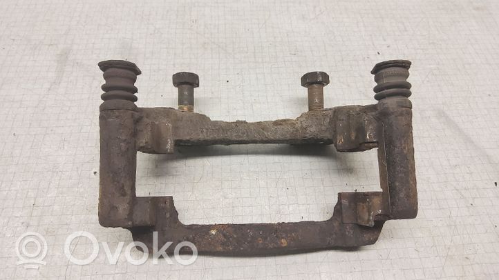 Nissan Almera N16 Caliper/mordaza del freno delantero 