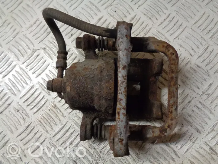 Nissan Qashqai+2 Rear brake caliper 