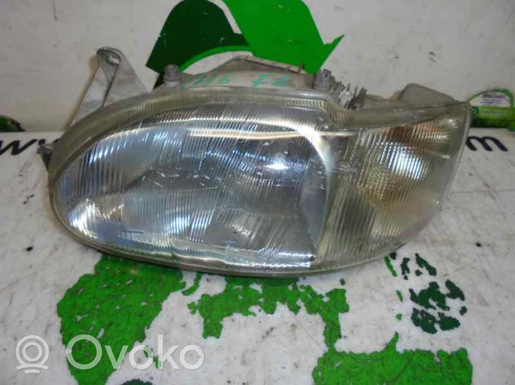 Ford Escort Lampa przednia 1076561