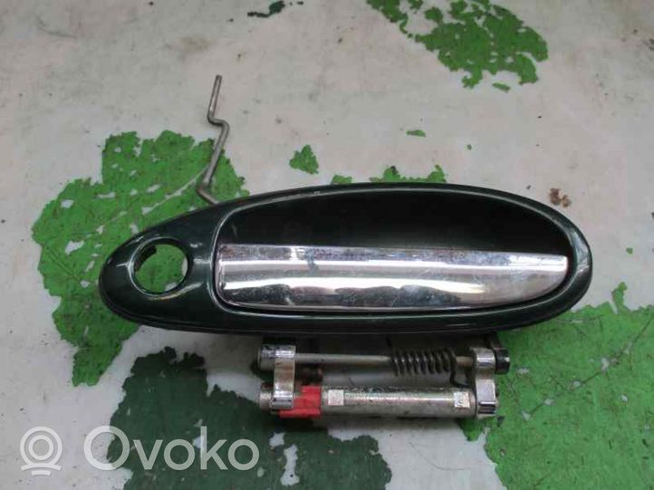 Nissan Maxima Front door exterior handle 8060741U10