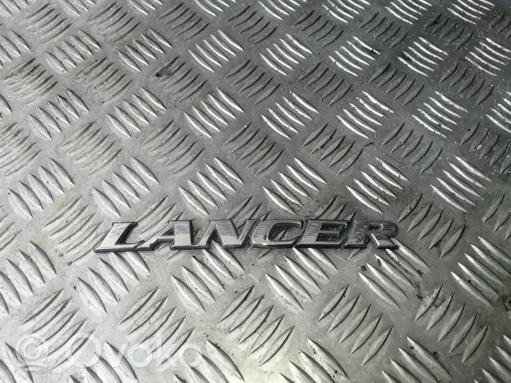 Mitsubishi Lancer Значок производителя / буквы модели 245075