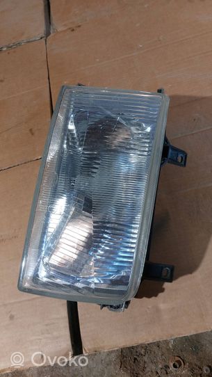 Volkswagen Multivan T4 Lampa przednia 7R0144438