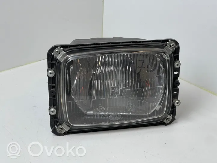 Mercedes-Benz 207 310 Lampa przednia 12130100