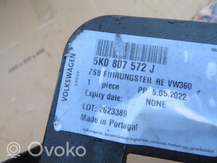 Volkswagen Golf VI Uchwyt / Mocowanie lampy przedniej 5K0807572.J