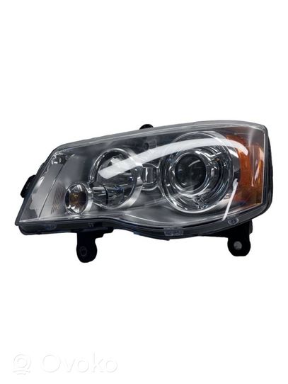 Chrysler Voyager Lampa przednia 05113339AD