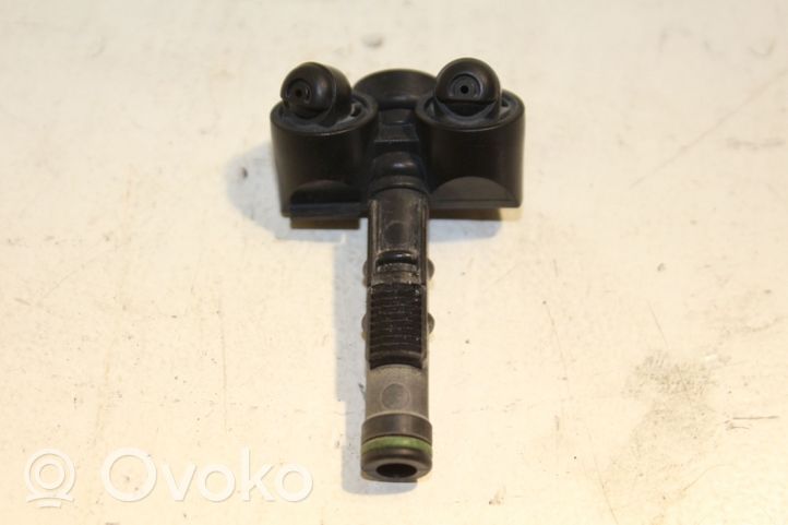 Volkswagen Tiguan Headlight washer spray nozzle 130860009