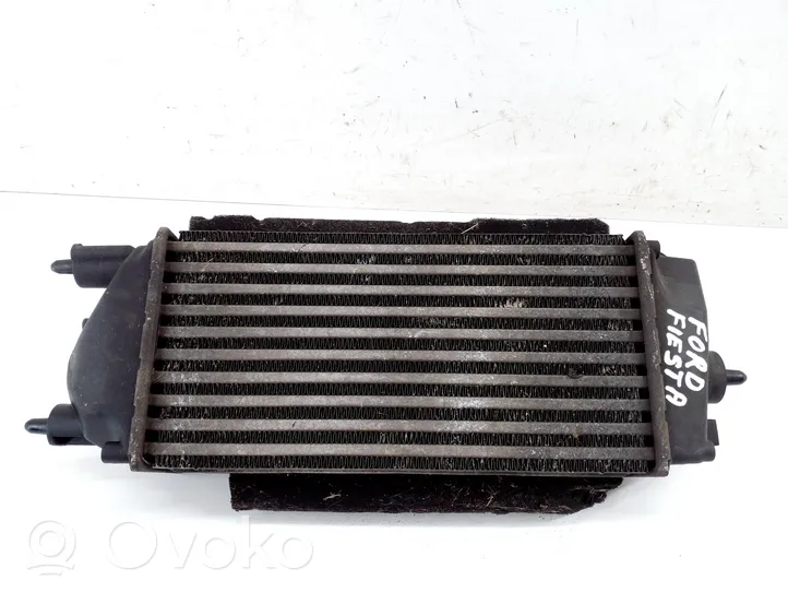 Ford Fiesta Starpdzesētāja radiators C1B19L440AB