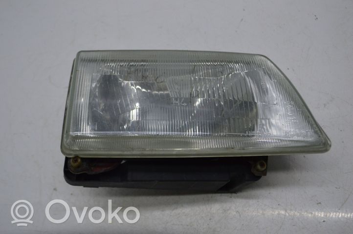 Opel Frontera A Lampa przednia 0301025752