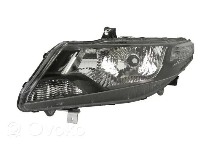 Honda City Lampa przednia 385109-E