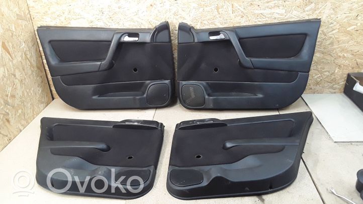 Opel Astra G Set di rivestimento del pannello della portiera 009100463