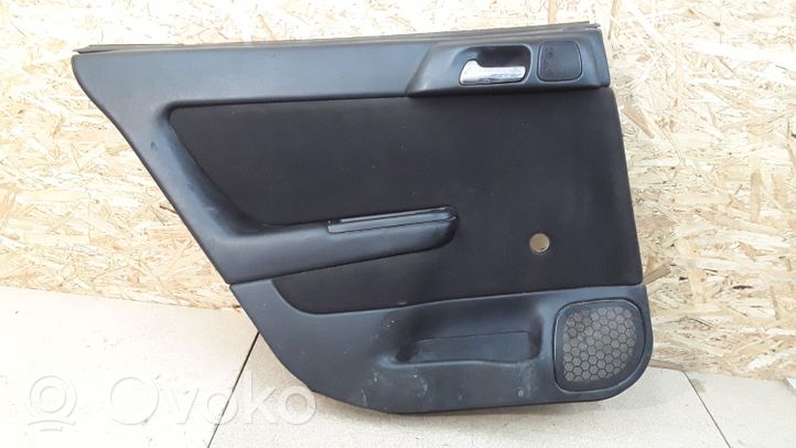 Opel Astra G Set di rivestimento del pannello della portiera 009100463