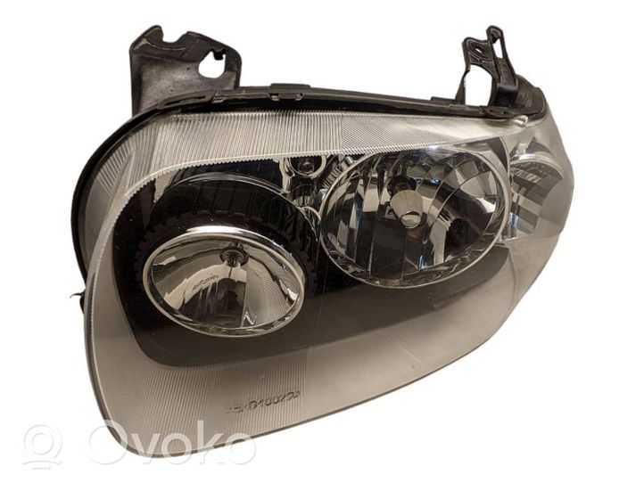 Ford Escape I Lampa przednia 5L8Z13008C